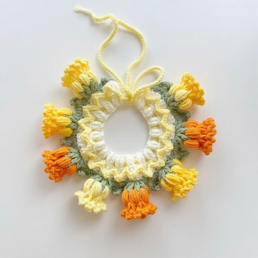 collier pour chien crochet fleurs jaune orange fond blanc