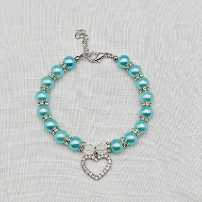 collier pour chiot perles bleu clair pendentif strass coeur fond lin