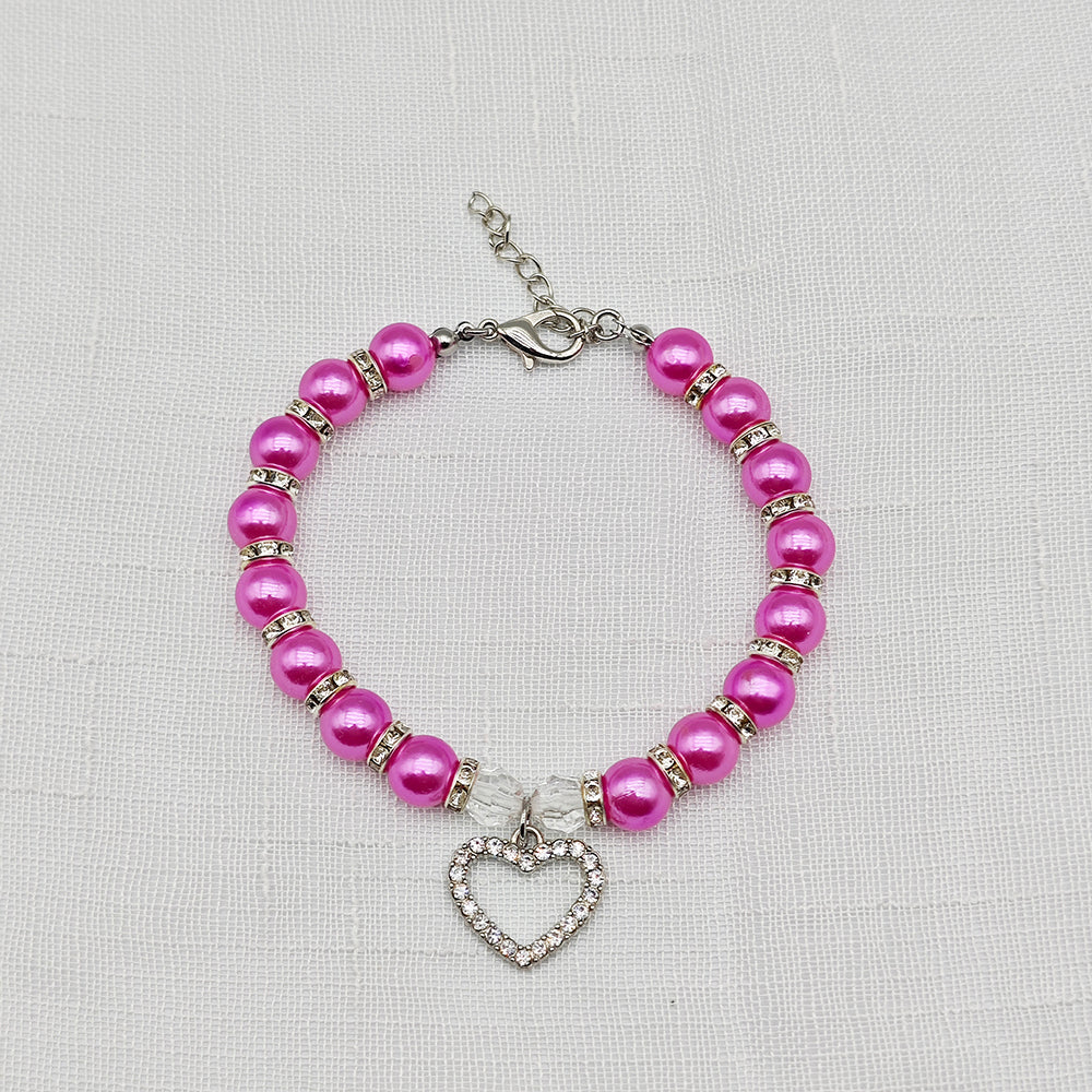 collier pour chiot perles rose fuchsia pendentif strass coeur fond lin