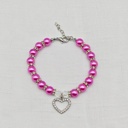 collier pour chiot perles rose fuchsia pendentif strass coeur fond lin
