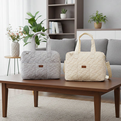 deux sacs de transport pour chien nylon gris beige poses sur table salon interieur