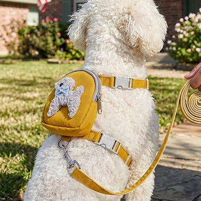 gros plan harnais pour chien sac a dos jaune et laisse