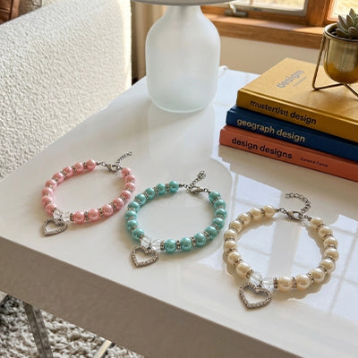 trois colliers pour chiot perles rose bleu blanc pendentif strass
